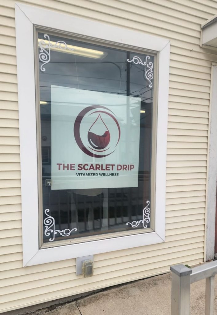 The Scarlet Drip window signage